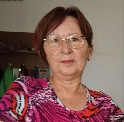 T.